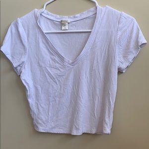 white fitted t-shirt with a v-neck